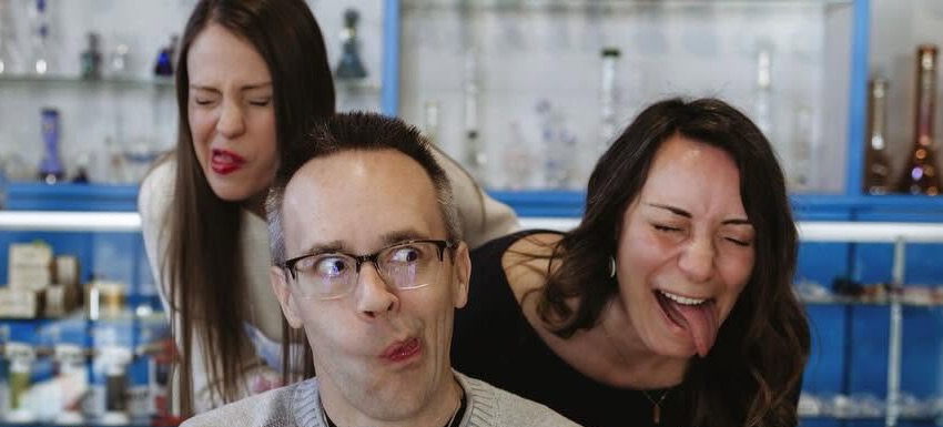 Fred, Kacy and Laya sharing a funny moment inside The Next Level Calgary shop
